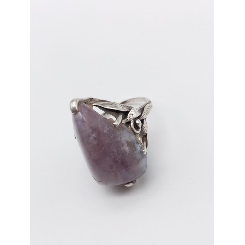 532 - Silver handmade ring with large purple stone, weight 9g and size M