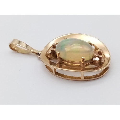 625 - 9ct yellow gold opal pendant, weight 4g and 4.5cm drop approx