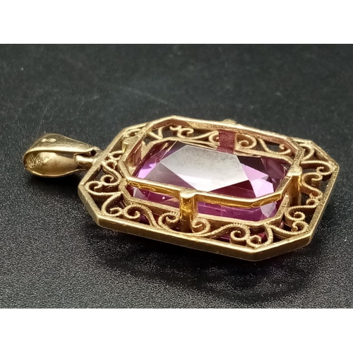 628 - Large Alexandrite pendant in 9ct yellow gold, weight 10g and 4cm drop