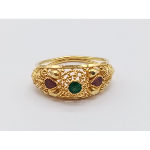 320 - 22CT YELLOW GOLD RING WITH EMERALD AND GARNET DECORATION , WEIGHT 2.6G AND SIZE N