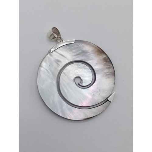 359 - Carved engraved mother of pearl shell silver pendant, weight 10g and 5.5cm diameter