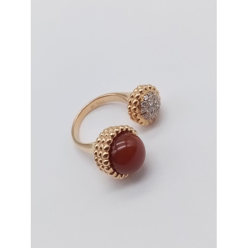 36 - AN UNUSUAL DOUBLE FACED DRESS RING IN 18CT ROSE GOLD WITH CARNELIAN AND DIAMONDS.
FITS ANY SIZE   9.... 
