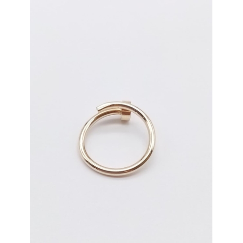 390 - 9CT YELLOW GOLD TWIST RING CARTIER STYLE, WEIGHT 3.2G SIZE N1/2