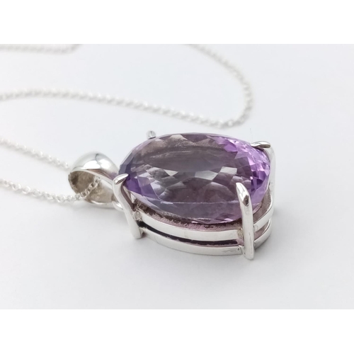 530 - An amethyst Ring  and matching pendant in 925 silver