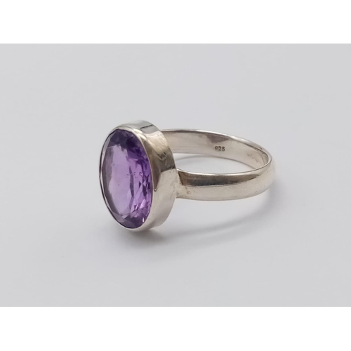 530 - An amethyst Ring  and matching pendant in 925 silver