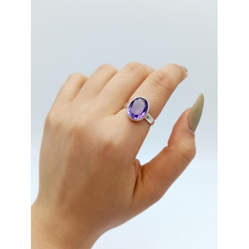 530 - An amethyst Ring  and matching pendant in 925 silver