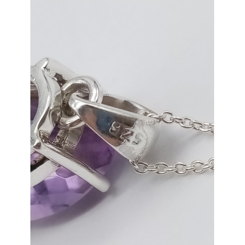 530 - An amethyst Ring  and matching pendant in 925 silver