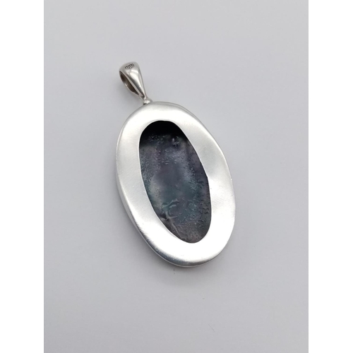 531 - Black mother of pearl large silver pendant, weight 14g and 5.5cm drop approx