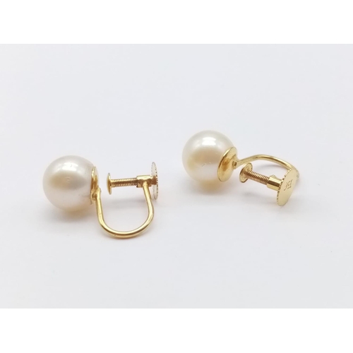 633 - Pair of 9ct pearl earrings, weight 2.28g