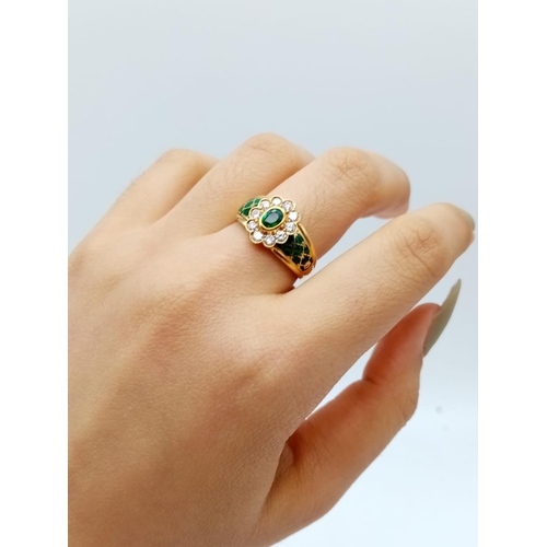 67 - AN 18CT YELLOW GOLD RING WITH BRILLIANT DIAMONDS AND EMERALDS.6.6gms  SIZE N