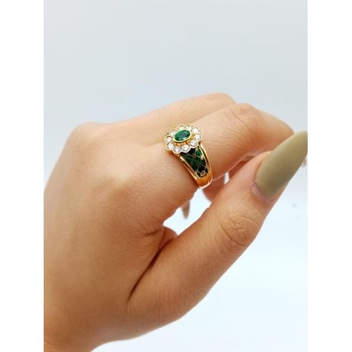 67 - AN 18CT YELLOW GOLD RING WITH BRILLIANT DIAMONDS AND EMERALDS.6.6gms  SIZE N
