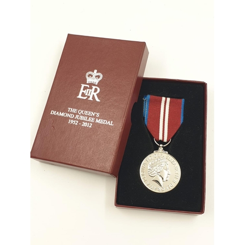 880 - Queens Diamond Jubilee Medal. Replacement medal in an original box.