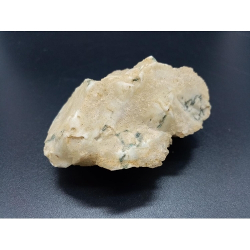 873 - A Large Crystal Specimen with Roquefort-like veins.  7 x 6cm. 124g.