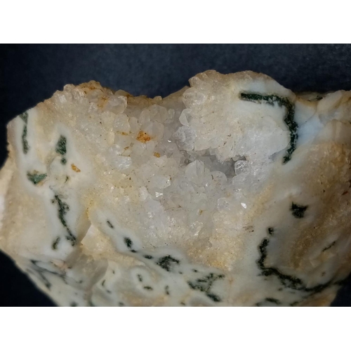 873 - A Large Crystal Specimen with Roquefort-like veins.  7 x 6cm. 124g.