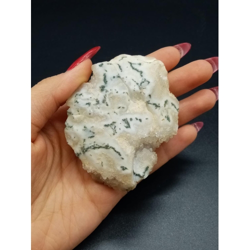 873 - A Large Crystal Specimen with Roquefort-like veins.  7 x 6cm. 124g.