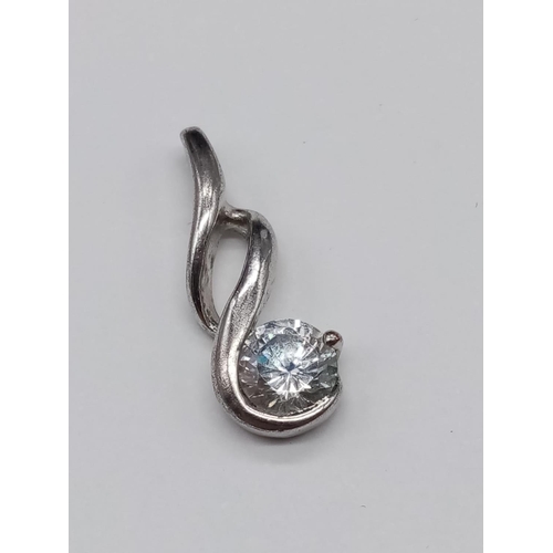 875 - A miniature Silver Pendant(2cm) and Ring, Size N. 5.22g total weight.