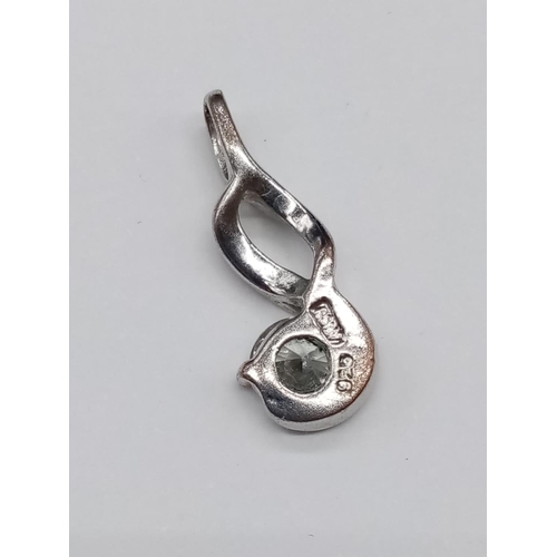 875 - A miniature Silver Pendant(2cm) and Ring, Size N. 5.22g total weight.