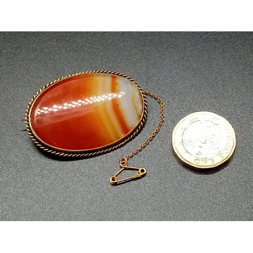 920 - Silver Gilt BROOCH with large Agate stone.  14.1g   4.5 x 3 cm