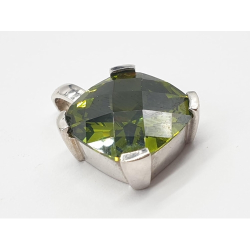 899 - A Stunning set of Moldavite Earrings and Brooch. All silver backed. 8.6g total weight