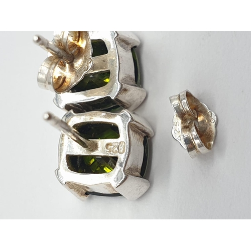 899 - A Stunning set of Moldavite Earrings and Brooch. All silver backed. 8.6g total weight