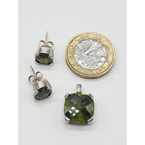 899 - A Stunning set of Moldavite Earrings and Brooch. All silver backed. 8.6g total weight