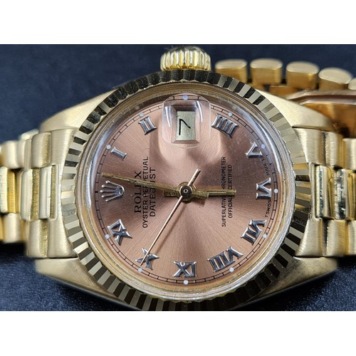 4 - 18CT GOLD LADIES ROLEX OYSTER PERPETUAL DATEJUST WITH ROMAN NUMERALS ON A COMPLIMENTARY ROSE COLOURE... 