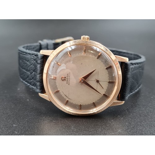 8 - VINTAGE OMEGA AUTOMATIC GENTS WATCH IN 18CT ROSE GOLD TWO TONE DIAL ON A LEATHER STRAP. 36MM