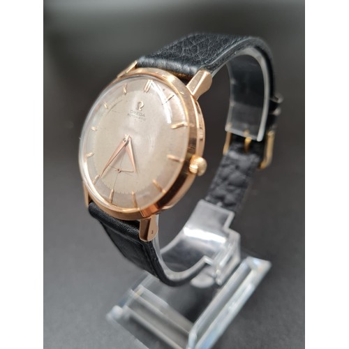 8 - VINTAGE OMEGA AUTOMATIC GENTS WATCH IN 18CT ROSE GOLD TWO TONE DIAL ON A LEATHER STRAP. 36MM