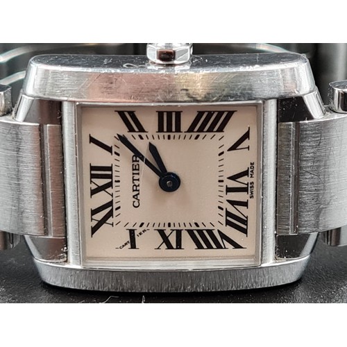 16 - A LADIES CARTIER TANK STYLE WATCH WITH QUARTZ MOVEMENT , ROMAN NUMERALS AND SAPHIRE WINDER 24MM