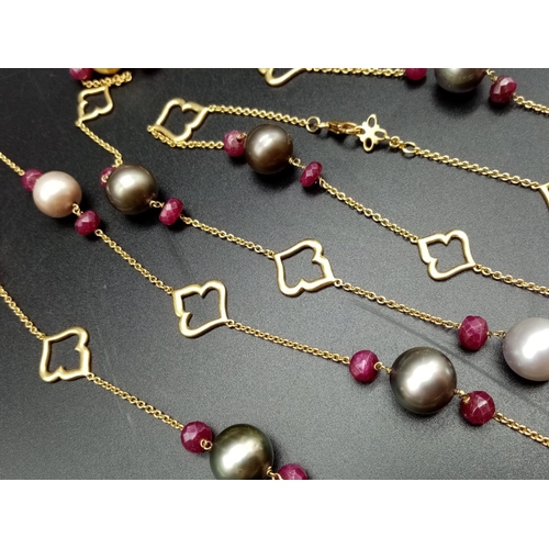 115 - AN 18CT GOLD NECKLACE WITH RUBY AND TAHITION PEARLS MEASURING 125 cms IN LENGTH AND WEIGHING 55.6 gm... 