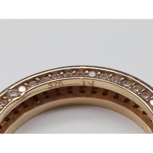 327 - 9CT YELLOW GOLD CZ BAND RING CARTIER STYLE , WEIGHT 3.6G