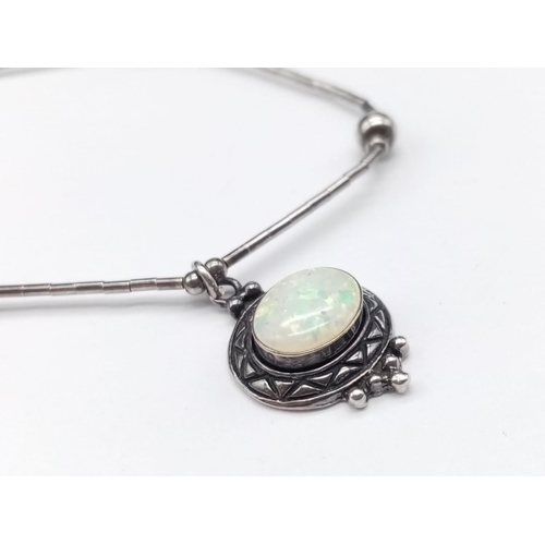 517 - Opal like silver necklace, weight 4.2g and 42cm long