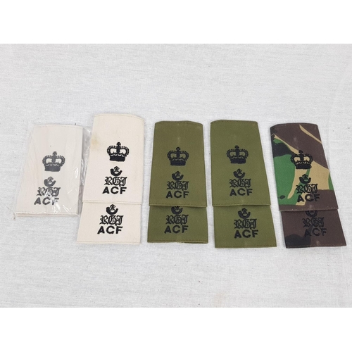 572 - Royal green jackets beret with 5 sets of shoulders patches, a first aid dressing kit, a beret and tw... 