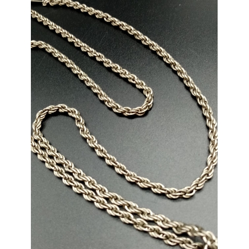 643 - White metal claw pendant on chain, weight 43g chain 72cm long and pendant 7cm drop approx