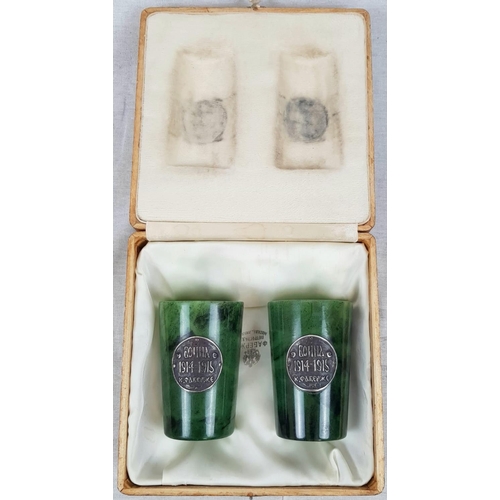 65 - Pair of Early 20th C Russian Imperial Silver Jade Cups.
Carved from green jade with a silver double ... 