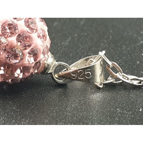 720 - Sterling silver pink crystal ball pendant on 18