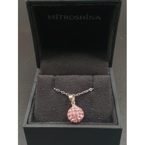 720 - Sterling silver pink crystal ball pendant on 18