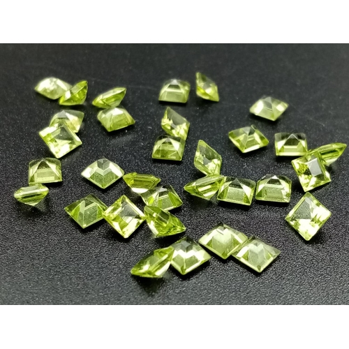 787 - Parcel of 32 square cut peridots total weight 10.65cts