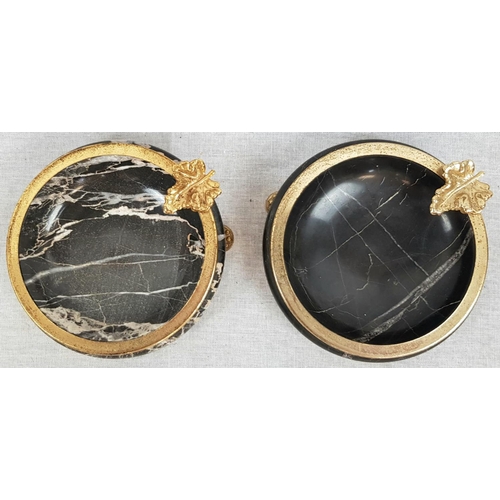 962 - A Pair of Vintage Marble Ashtrays. Black marble with gilded decoration, including leaf cigarette hol... 