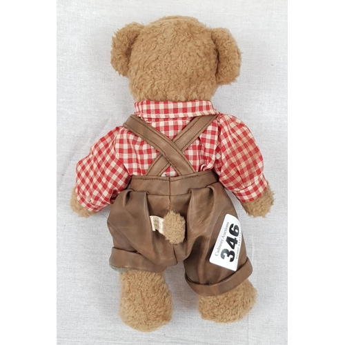 889 - A Vintage, plush German Teddy Bear, wearing vinyl lederhosen. 25cm.