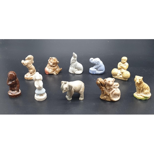 909 - A Selection of 10 ceramic miniature Wade animal figurines.