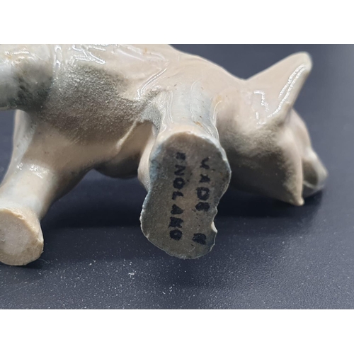 909 - A Selection of 10 ceramic miniature Wade animal figurines.