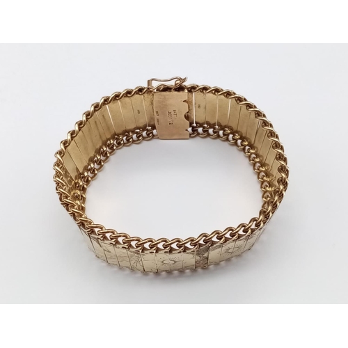 229 - 9ct Gold Articulated Engraved BRACELET. weight 42.4g and 18cm long approx