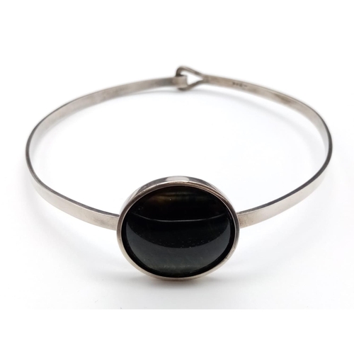 518 - Large cat eye stone silver choker necklace, weight 37g and 10.5cm diameter, stone is 3.5cm