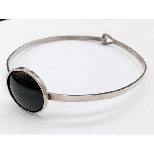 518 - Large cat eye stone silver choker necklace, weight 37g and 10.5cm diameter, stone is 3.5cm