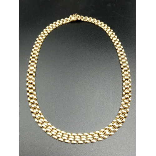 795 - A 9CT GOLD CHOKER STYLE NECK CHAIN BEING 40CMS LONG AND 1CM WIDE   23.5GMS