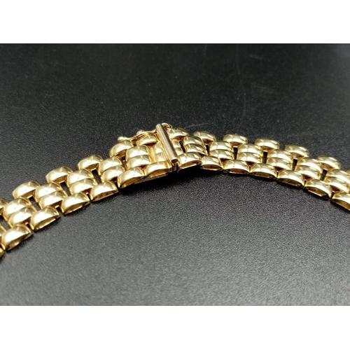 795 - A 9CT GOLD CHOKER STYLE NECK CHAIN BEING 40CMS LONG AND 1CM WIDE   23.5GMS