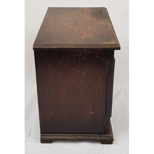 950 - A delightful Antique small Wooden Cabinet. Double doors with three interior levels. 33 x 32cm