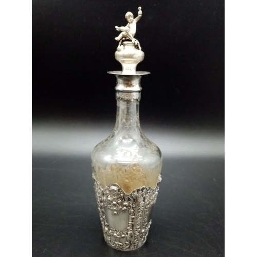 507 - A beautiful pair of antique silver etching bottles. Dated London 1896 and imported by Berthold Mulle... 