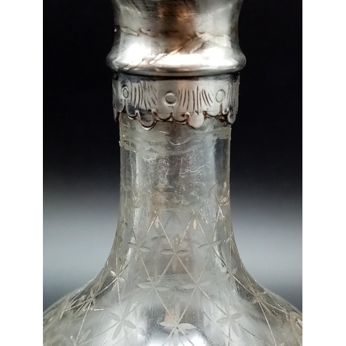 507 - A beautiful pair of antique silver etching bottles. Dated London 1896 and imported by Berthold Mulle... 